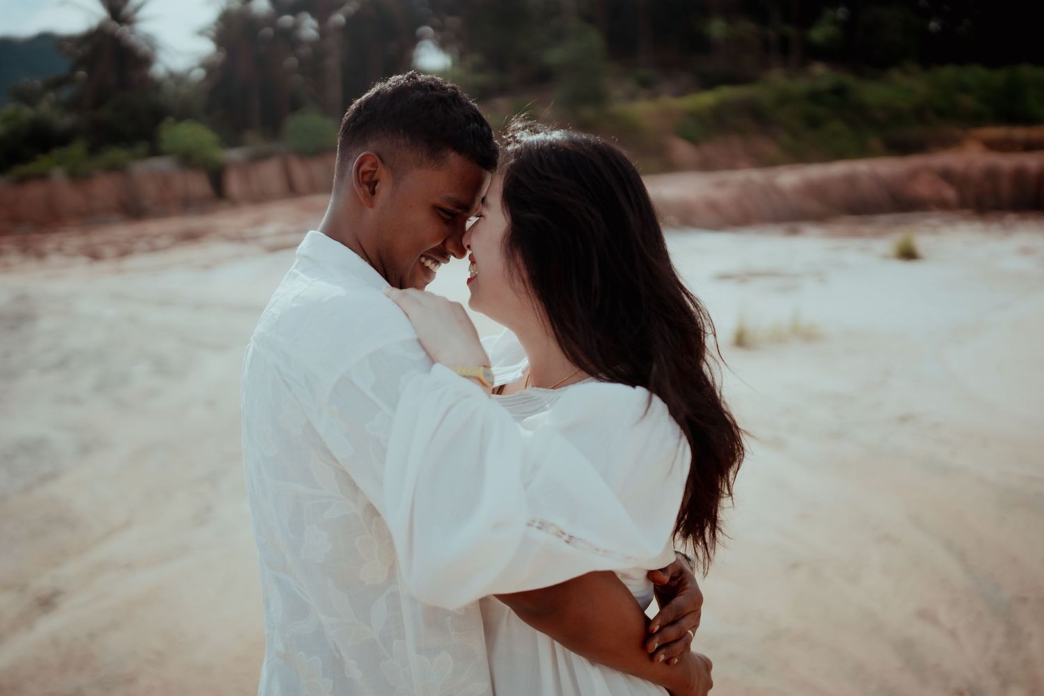 Romantic couple portrait captured during an engagement photoshoot, showcasing genuine connection, natural light, and timeless storytelling.
