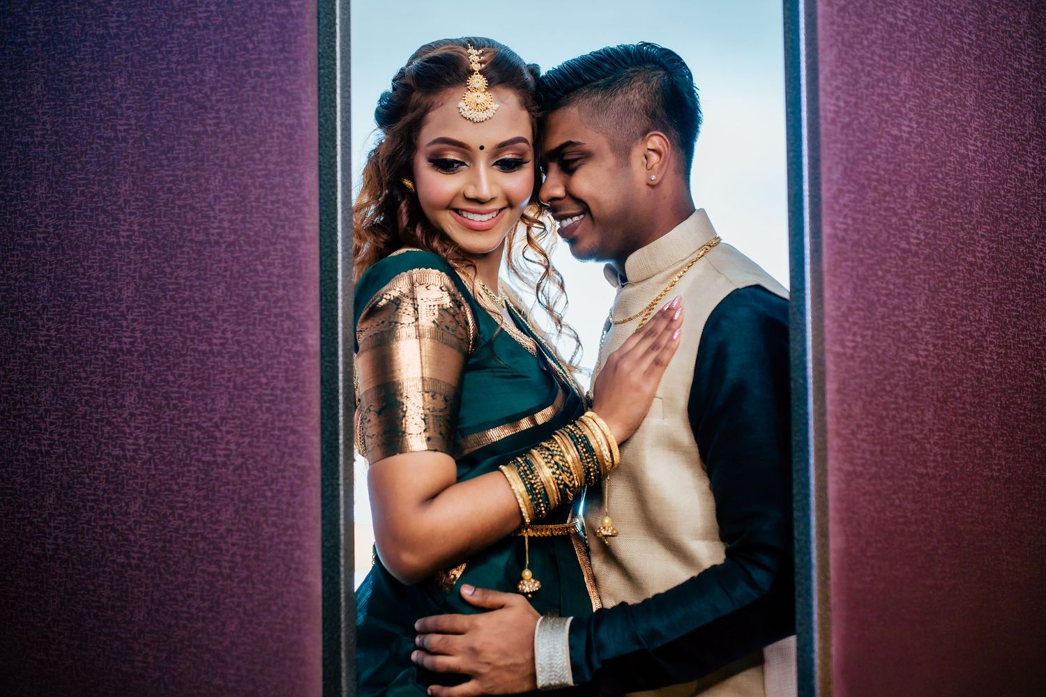 Romantic couple portrait framed creatively, cinematic wedding photography