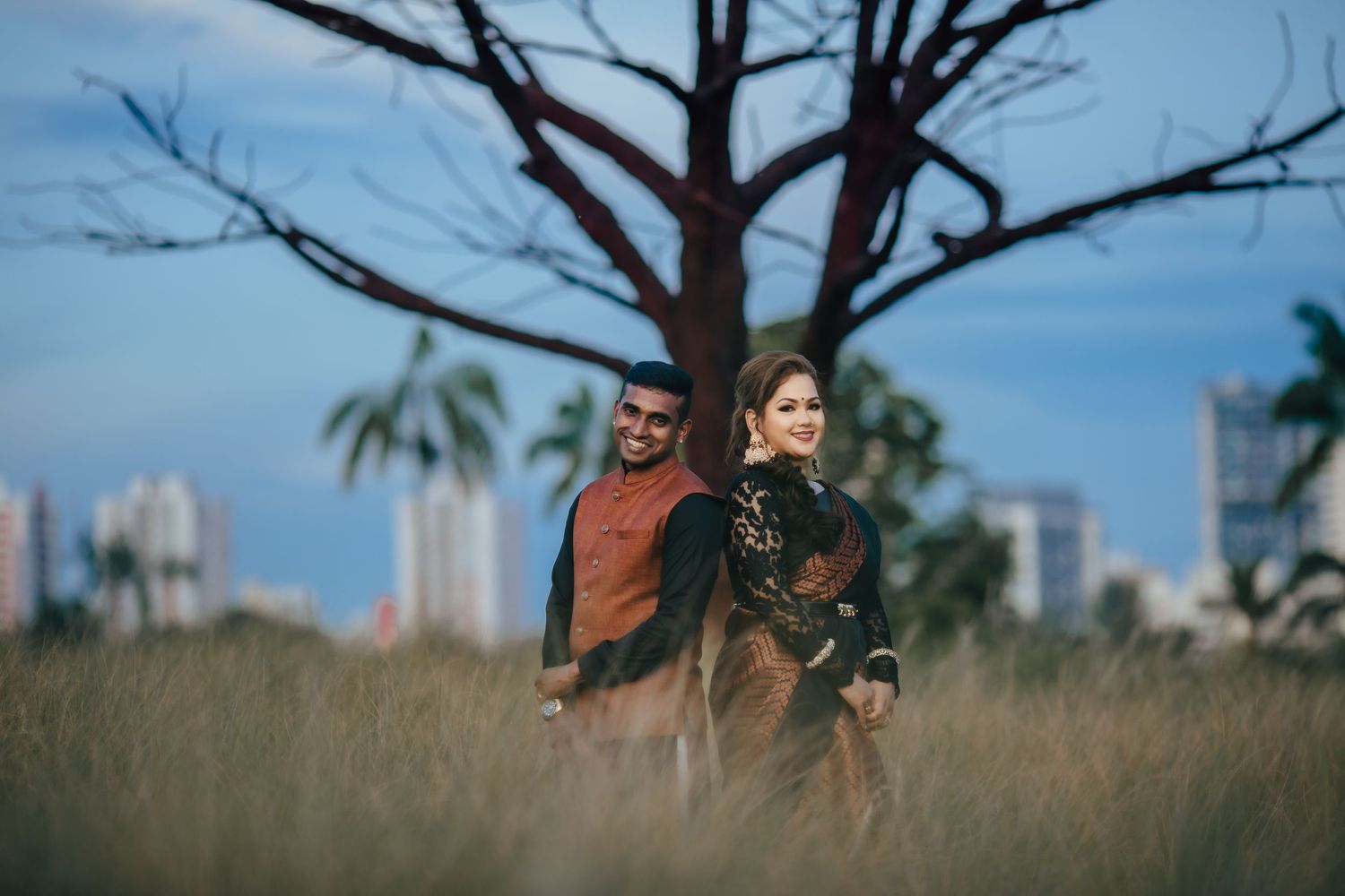 Couple portrait with dramatic sky and landscape, cinematic pre wedding Singapore