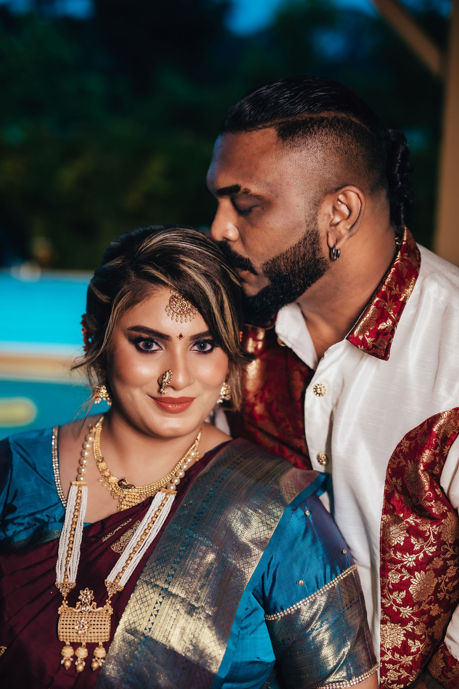Indian engagement couple Sangeeta and Uthayanathan in traditional attire, romantic portrait with natural lighting, wedding photography Singa