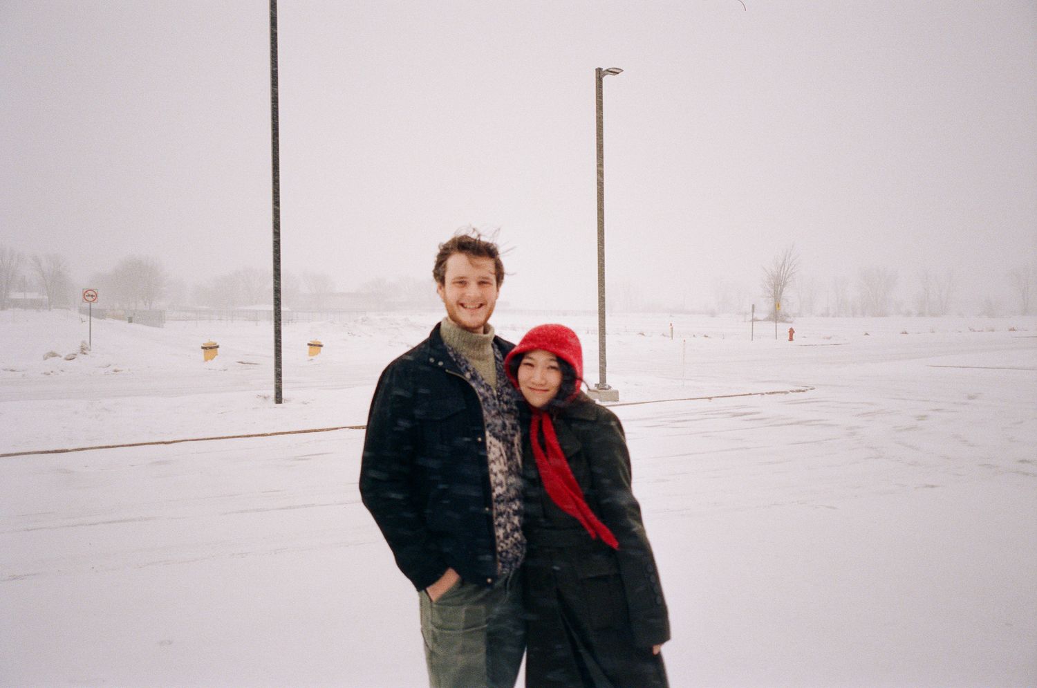 ILO Studio founders Bradley and Clarise posing together in snowy Quebec during a winter day off.