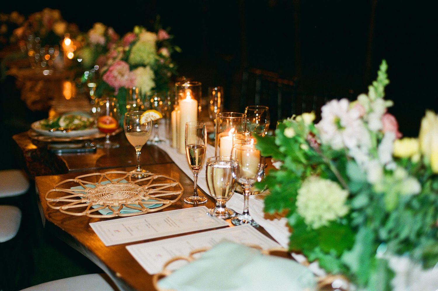 Elegant candlelit reception table with white florals and glassware at Kurtz Orchards in Niagara-on-the-Lake wedding.