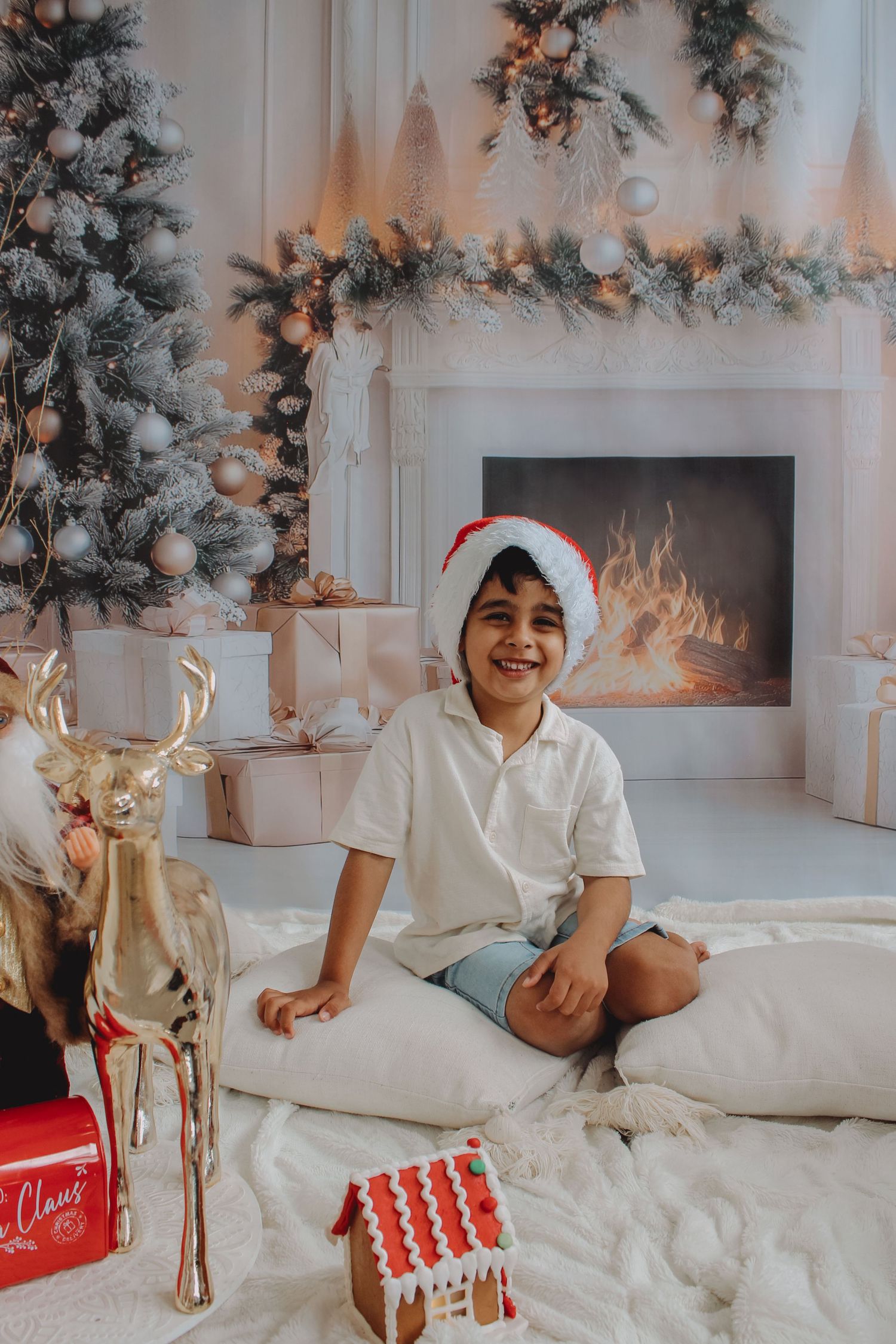 Kid with santa Hat prop for studio minis, Auckland