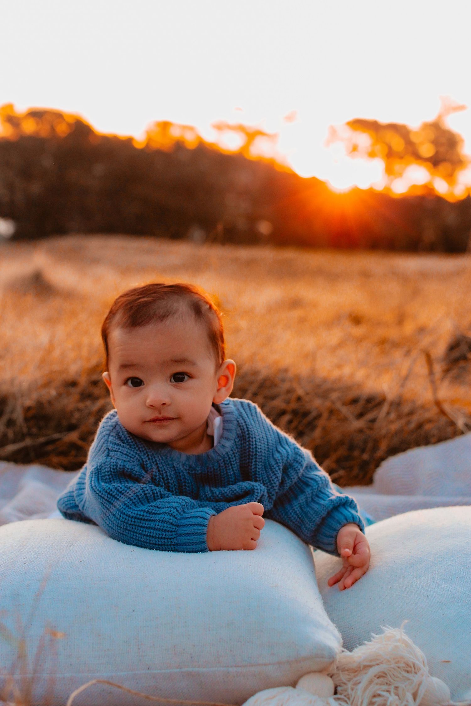 Newborn and baby photo outside during golden hour, auckland.