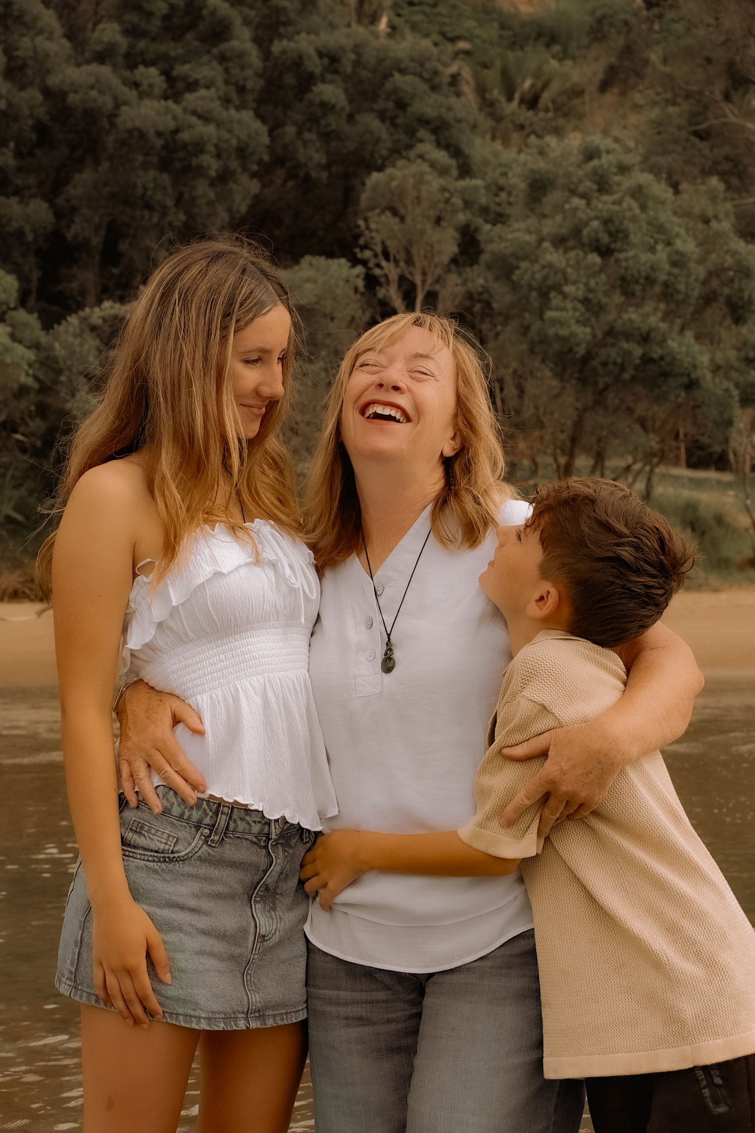 Family Photographer based in Auckland. Children and Nana laughing.