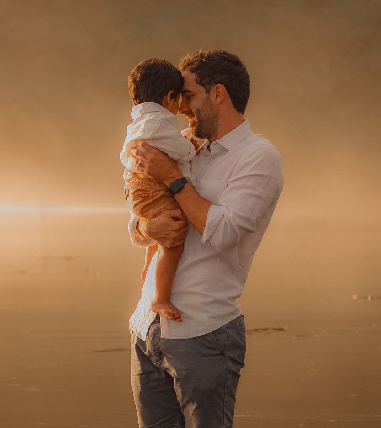 Family Photographer in Auckland. Soft warm tones, during golden light.