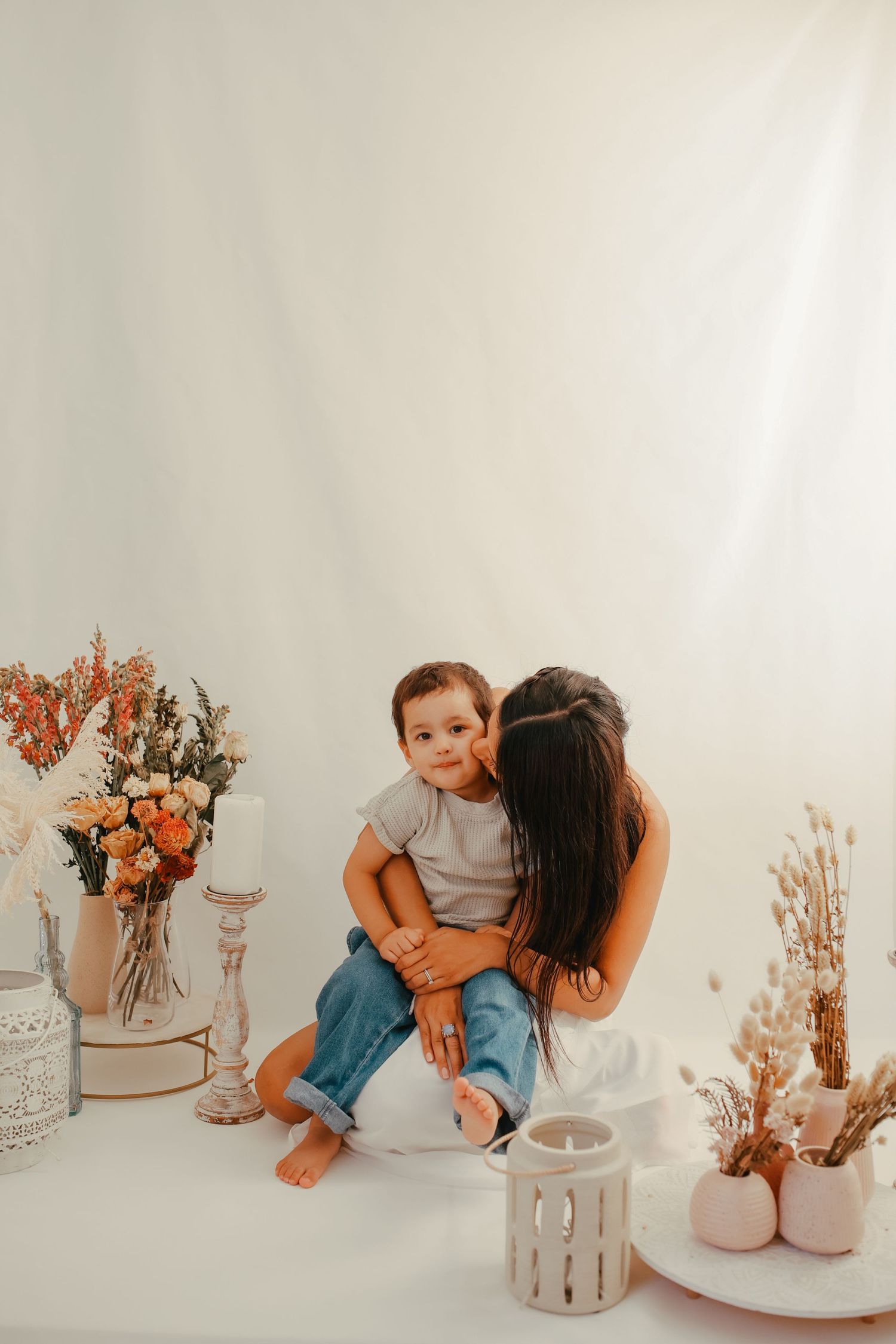 Sweet moment between a mother and her newborn baby, lifestyle Mother's Day photography.