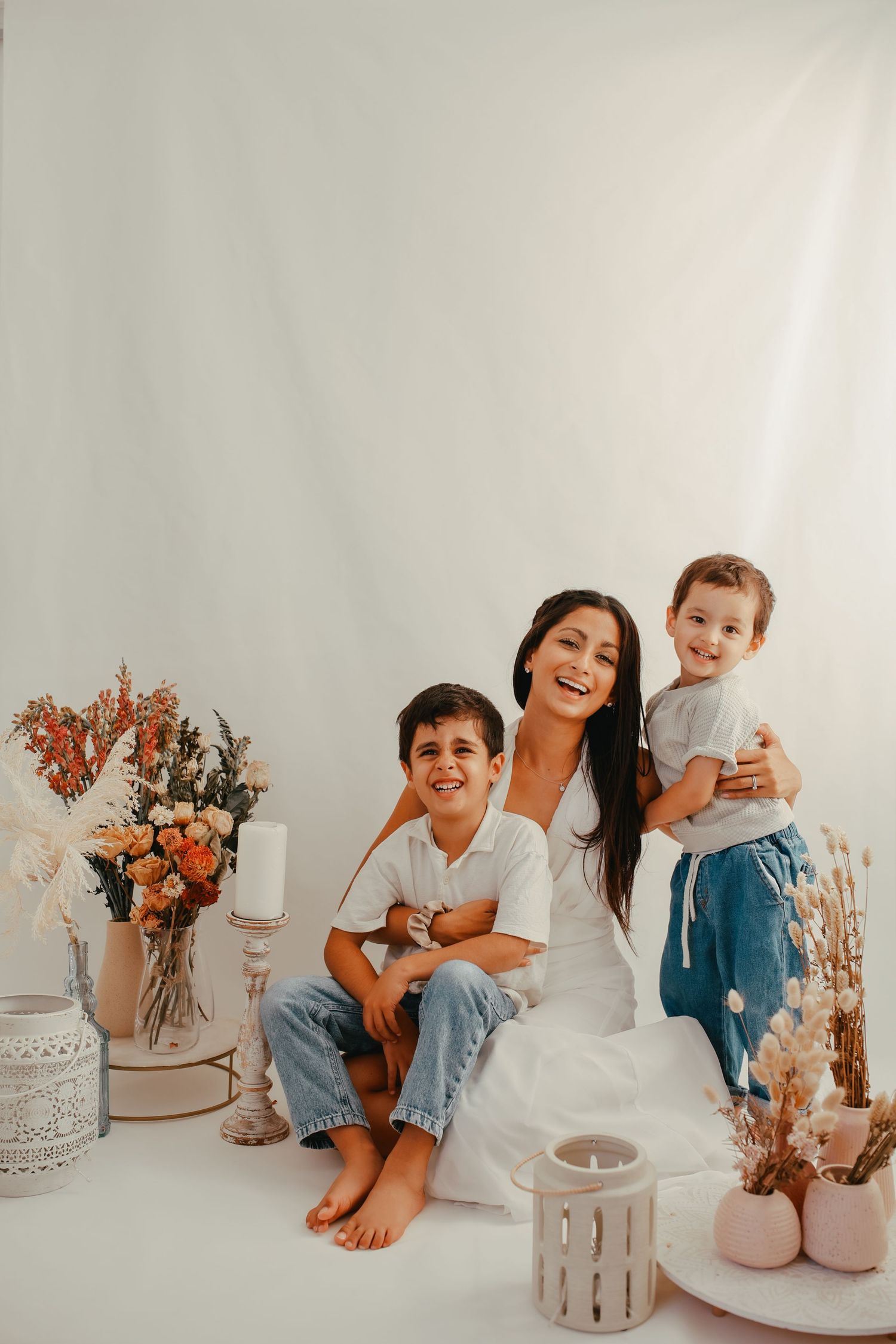 Ethereal maternity portrait for Mother’s Day featuring a flowing silk dress.