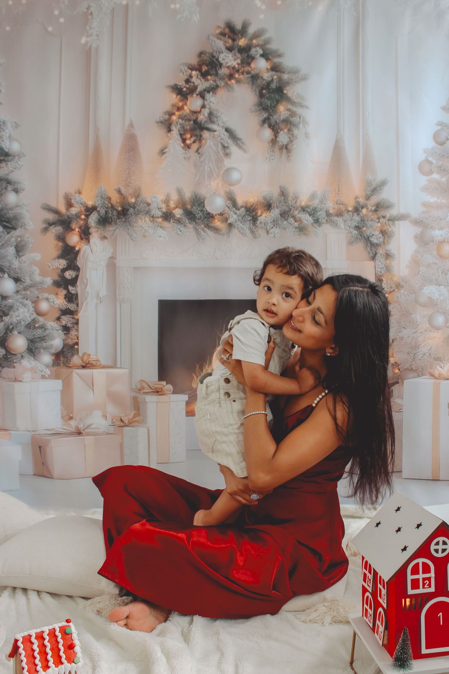 Minimalist Christmas studio session in Auckland with neutral tones and a simple pine tree.