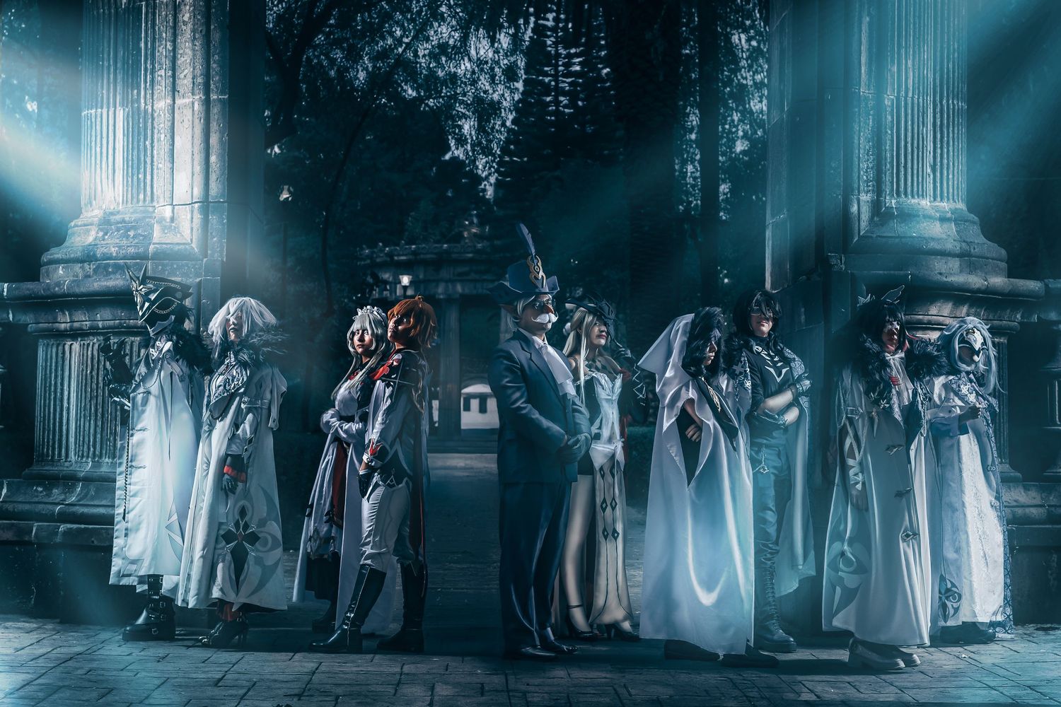 Atmospheric fantasy scene with cloaked figures in misty gothic architecture.