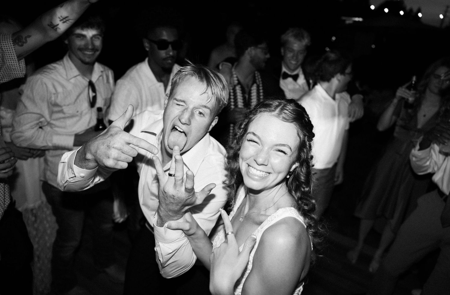 Black and white photo montage showing people dancing and celebrating at what appears to be a party or celebration.