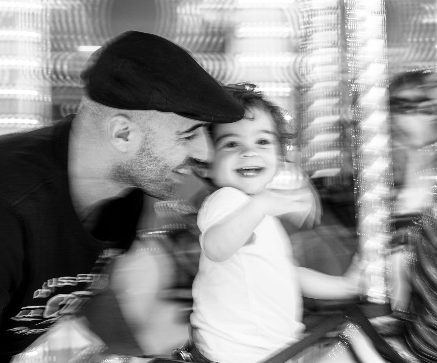 Headshot of Mariano Alvarez with his toddler son, he is a Newport Beach family and lifestyle photographer