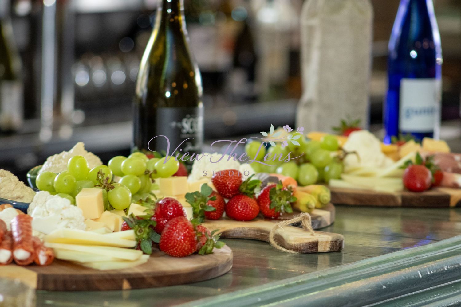 Charcuterie board and refreshments prepared for a community event photographed by View The Lens Studio.