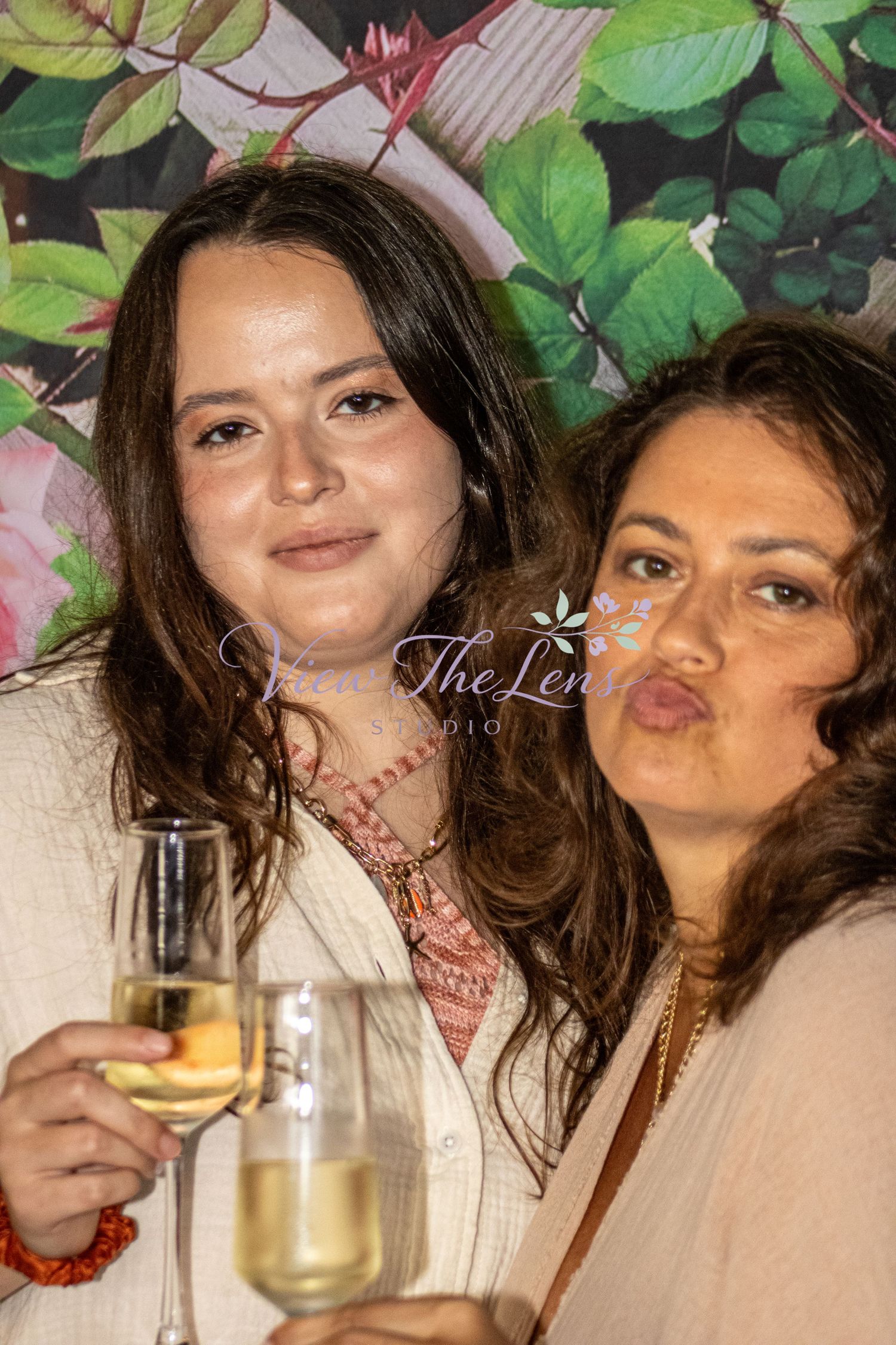 Two guests enjoying a community event photographed by View The Lens Studio on Florida's Treasure Coast.