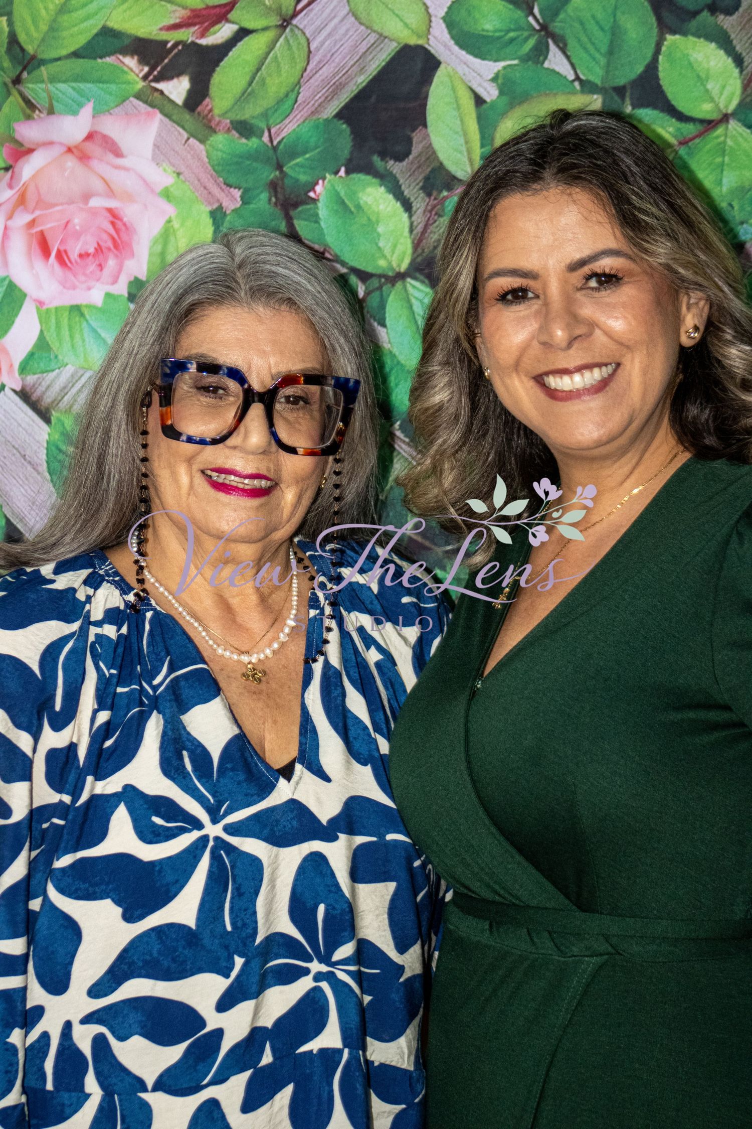 Portrait of two guests celebrating together at a special event.