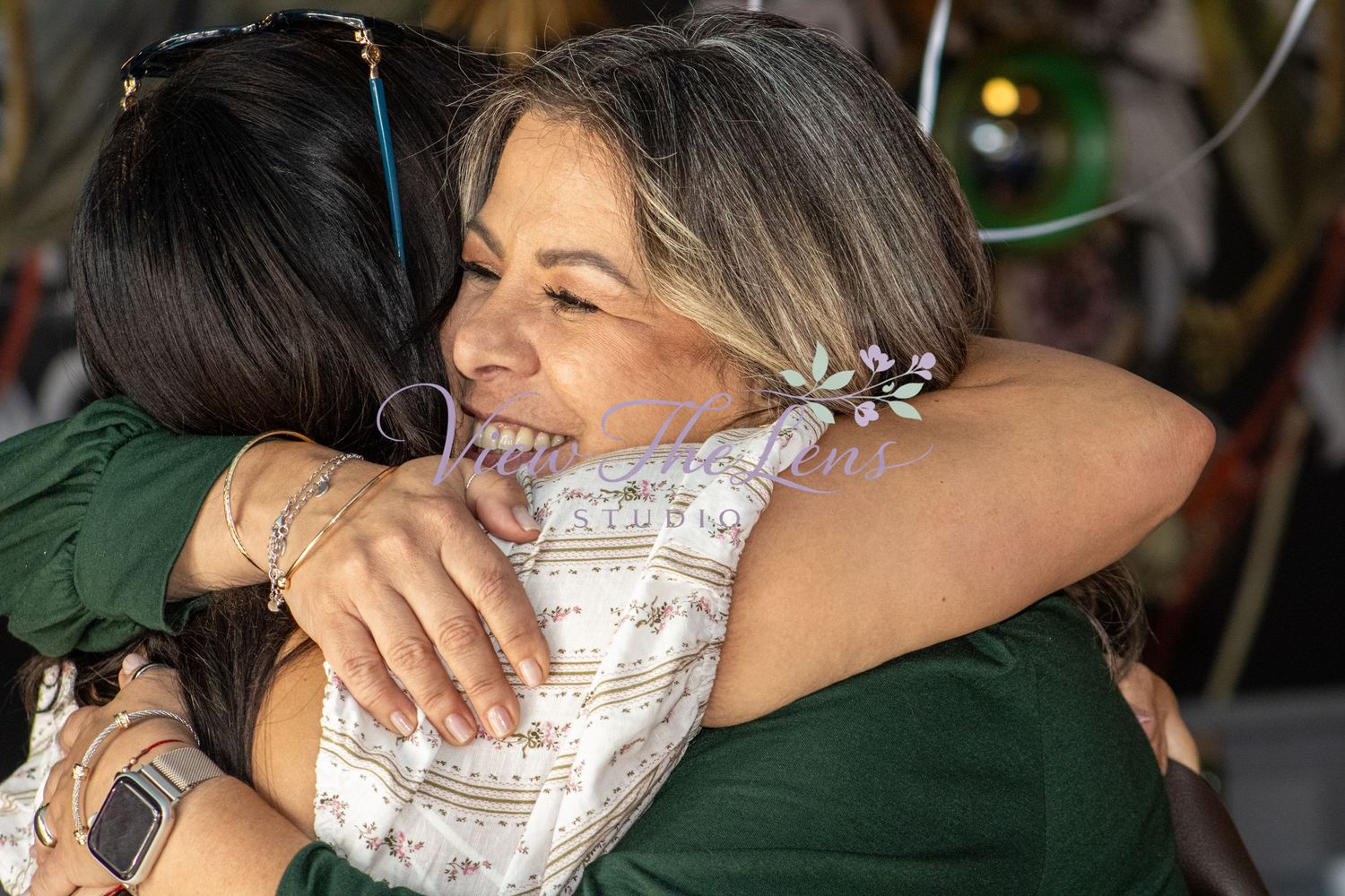 Emotional candid moment between guests during a special event.