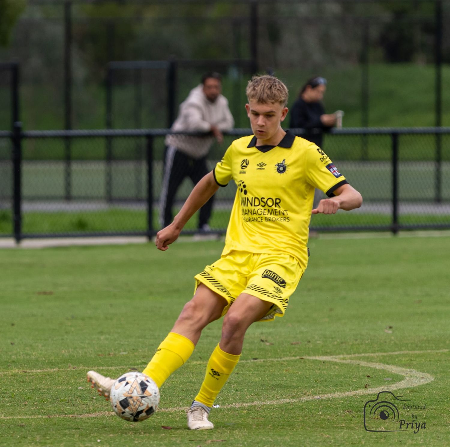 Youth football player dribbling Melbourne grassroots sport photography by kaptured.by.Priya