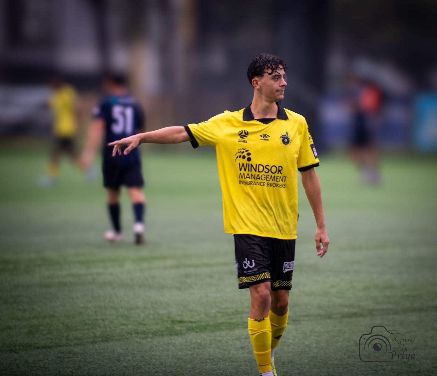 Youth football player in action Melbourne grassroots sport photography by kaptured.by.Priya