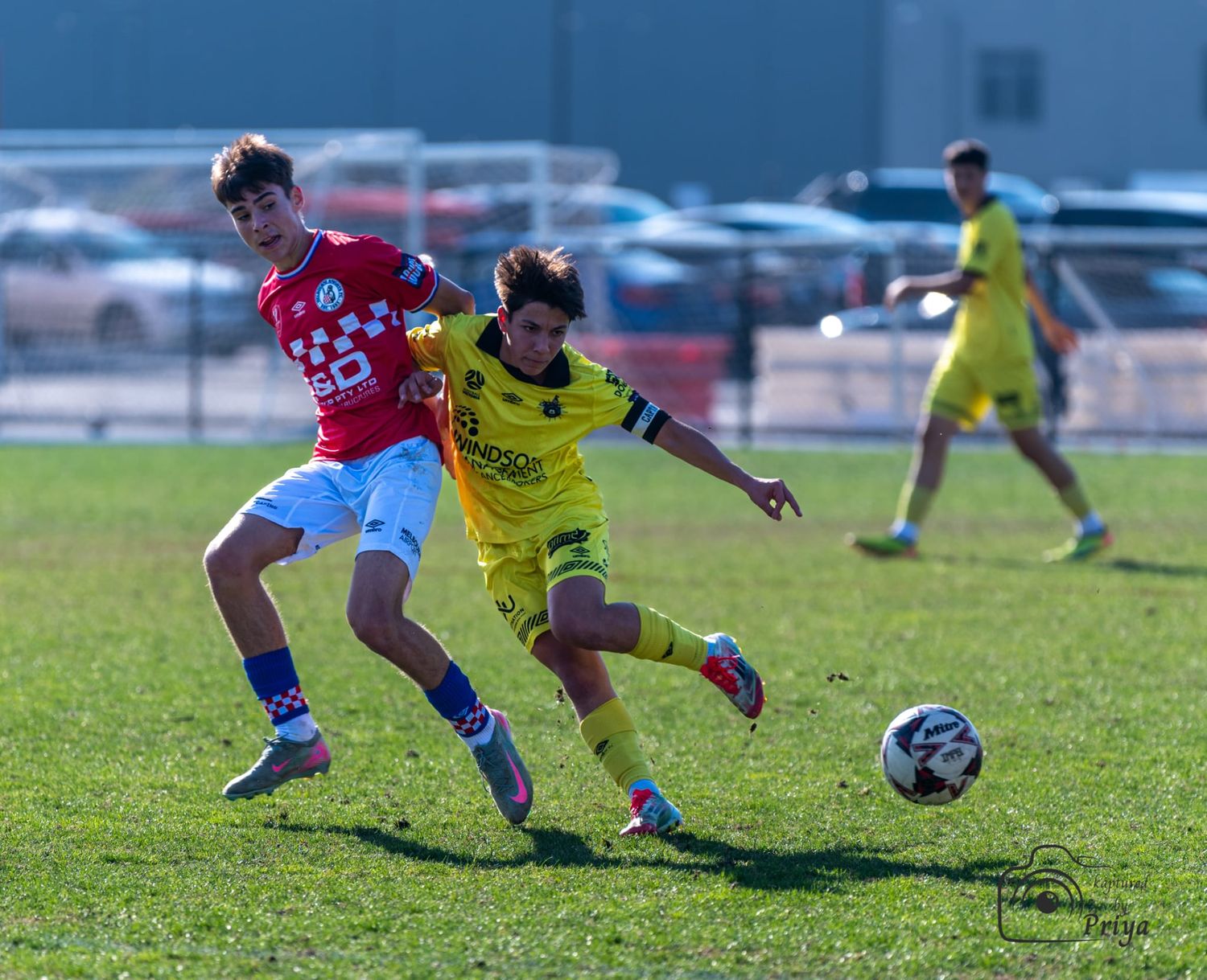 Youth football tackle challenge Melbourne grassroots sport photography by kaptured.by.Priya