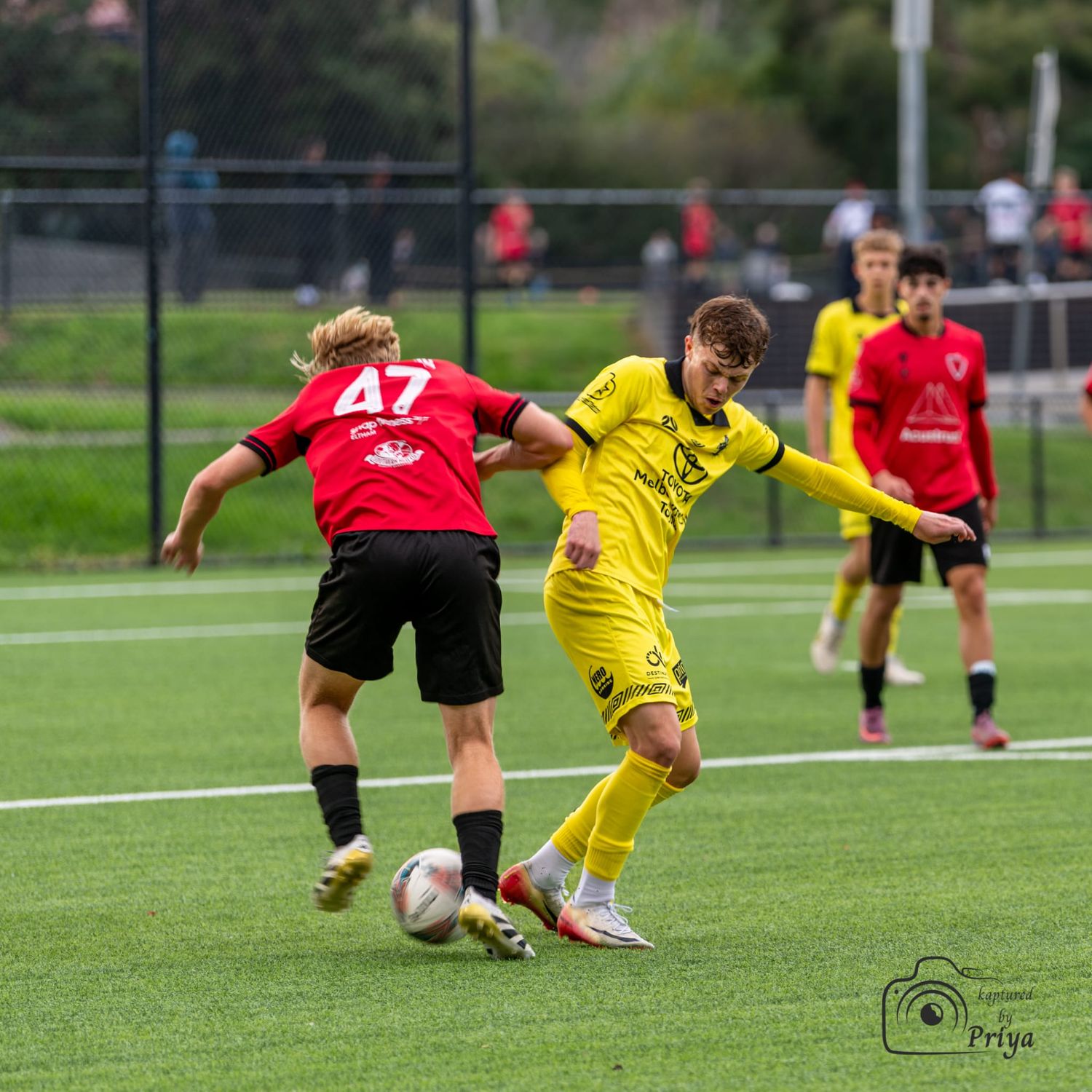 Youth football action shot Melbourne grassroots sport photography by kaptured.by.Priya