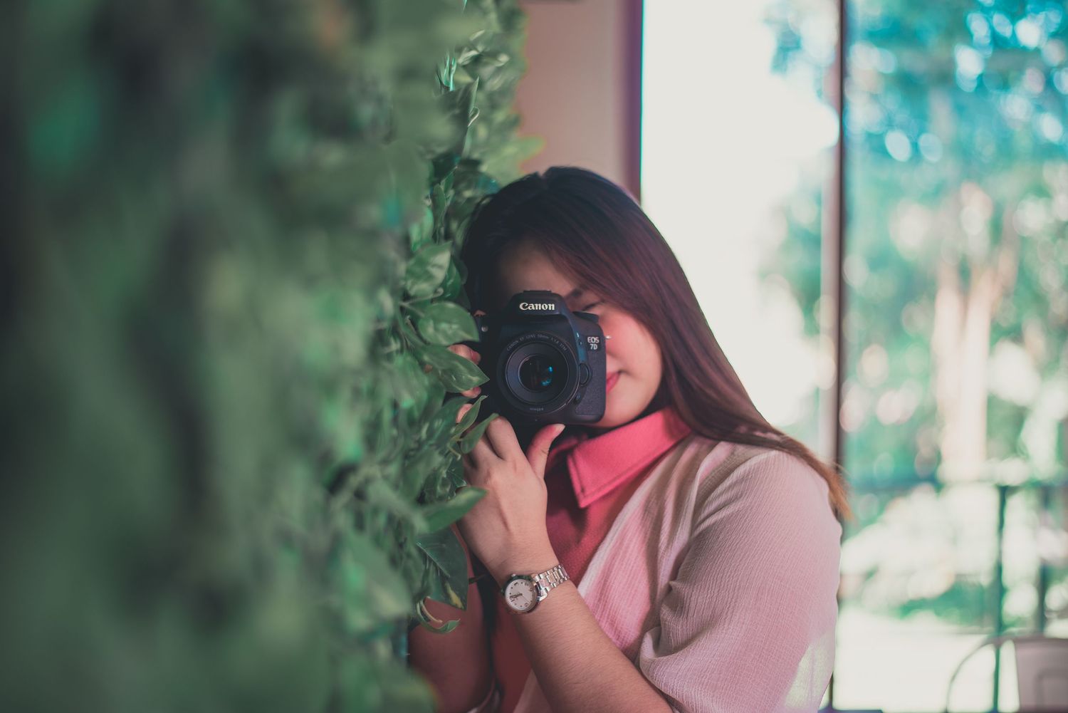 Thea taking your photo