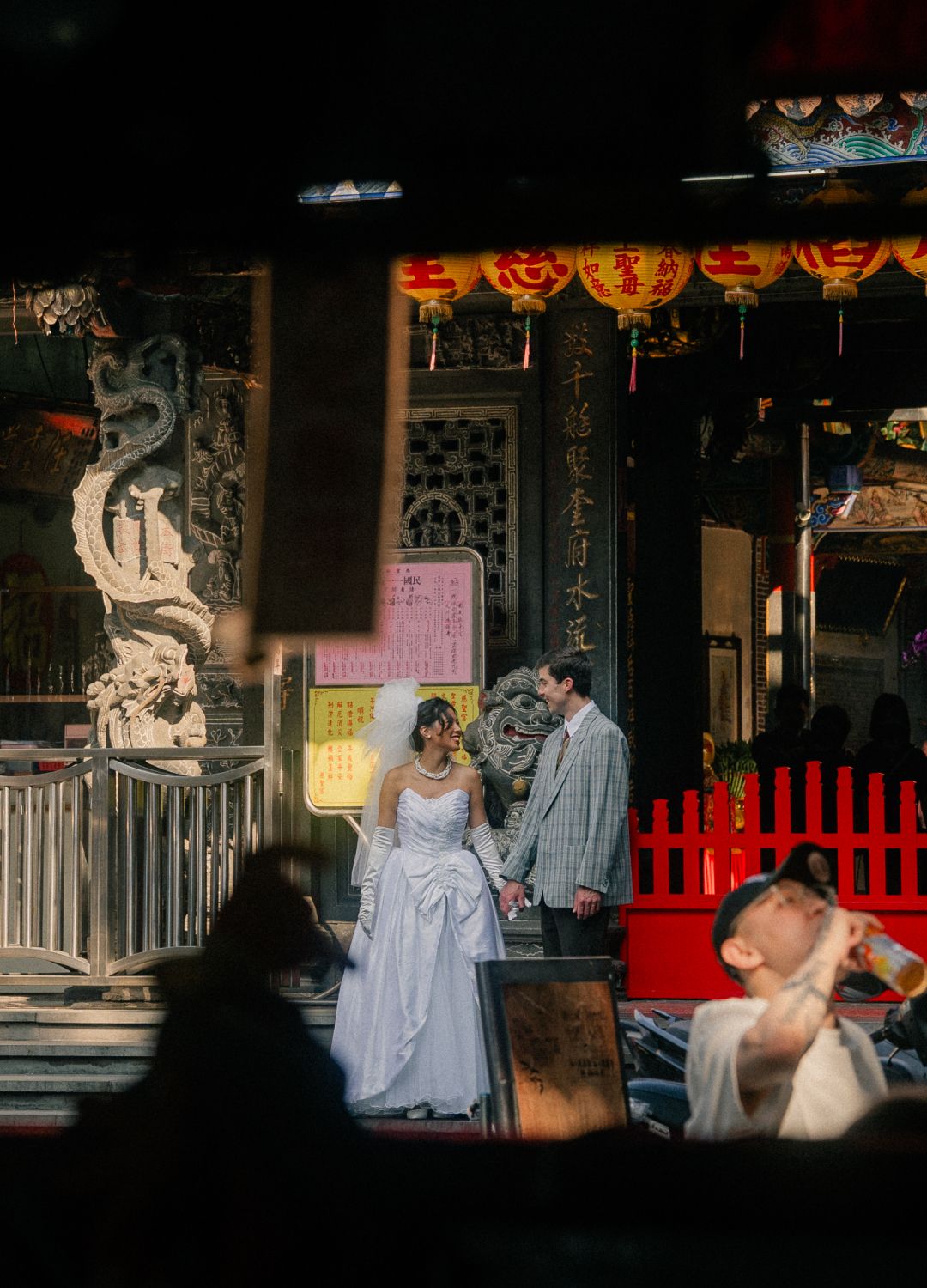 Emily and Rik exploring Dadaocheng together during their vintage-inspired Taipei engagement photoshoot