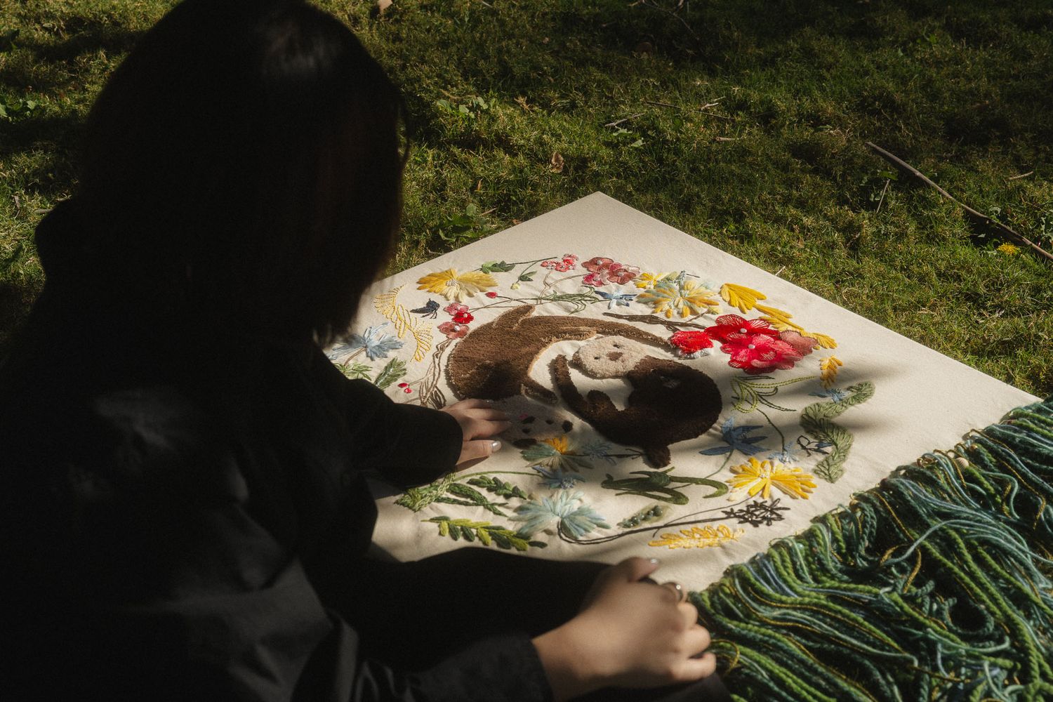 Taiwan personal branding photography detail of a textile artist working on a floral fabric piece