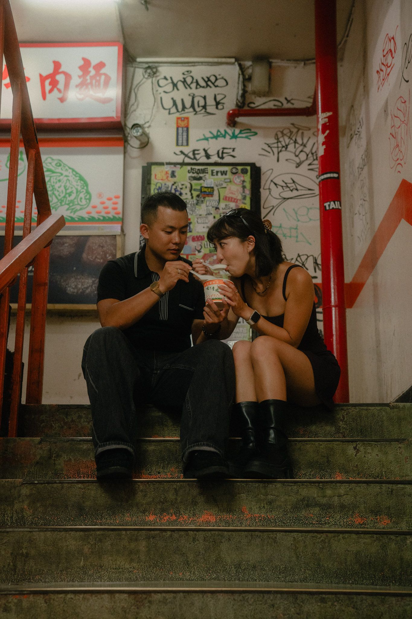 Taipei Ximending Night Market Couple Photoshoot   sharing dessert in the staircase
