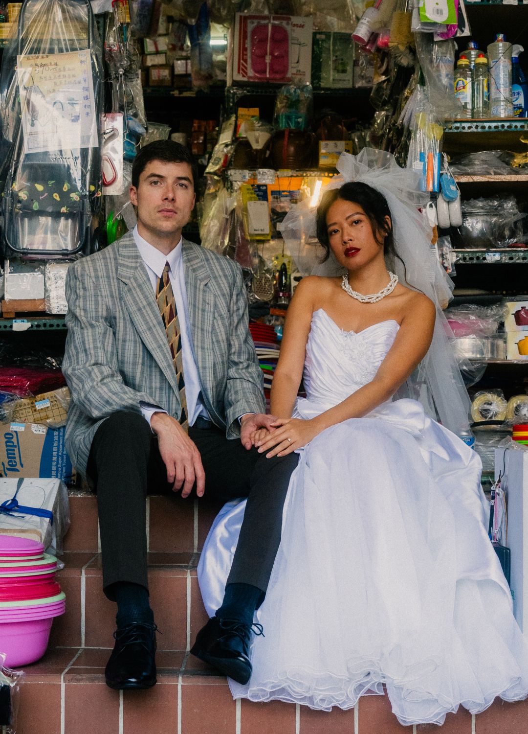 Emily and Nik exploring Dadaocheng together during their vintage-inspired Taipei engagement photoshoot