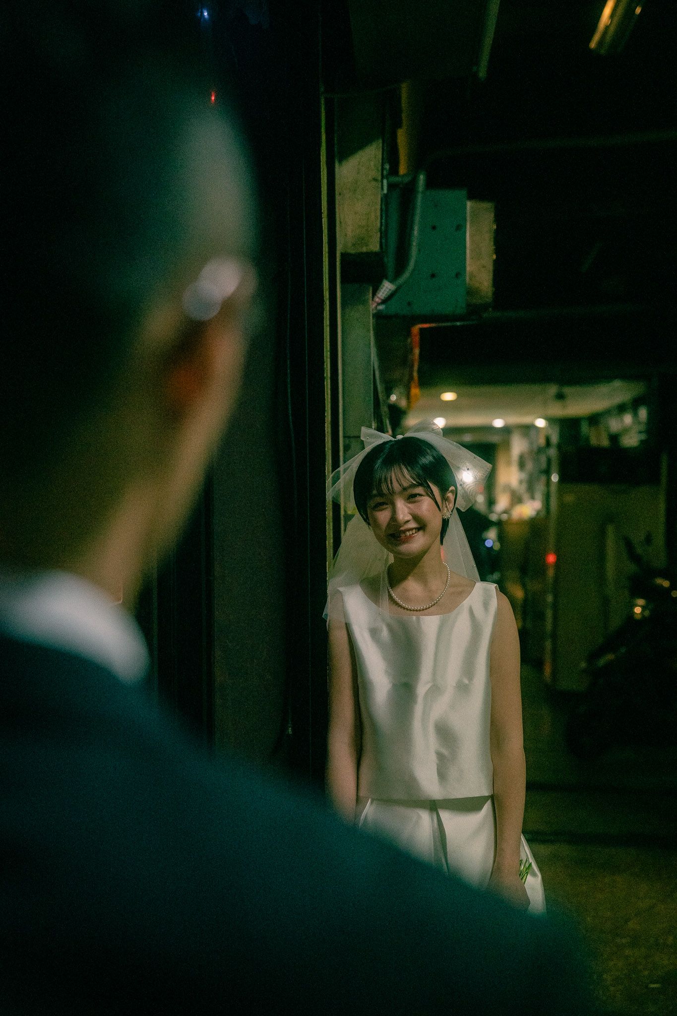 Individual night portraits of Sunny and Leo in a narrow alley near Huaxi Street Night Market