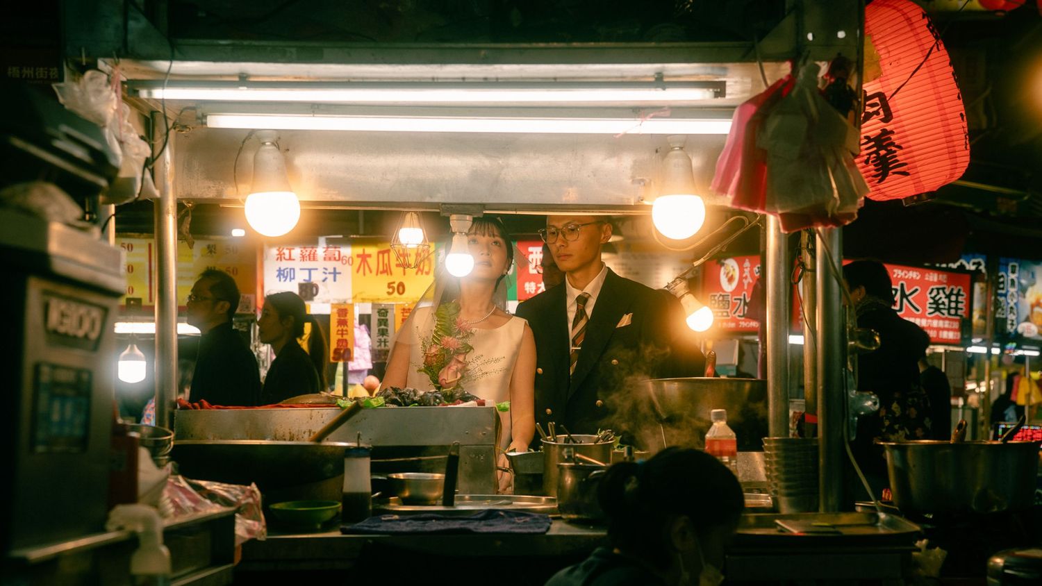 Taipei pre-wedding photographer capturing a cinematic couple portrait at a traditional Taiwanese night market