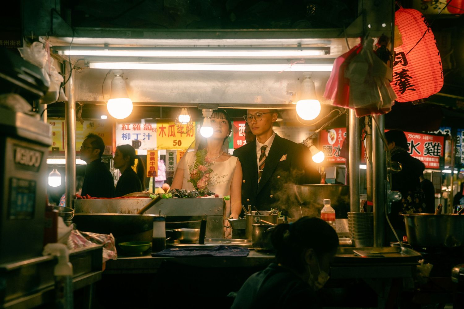 Taipei pre-wedding photographer capturing a cinematic couple portrait at a traditional Taiwanese night market
