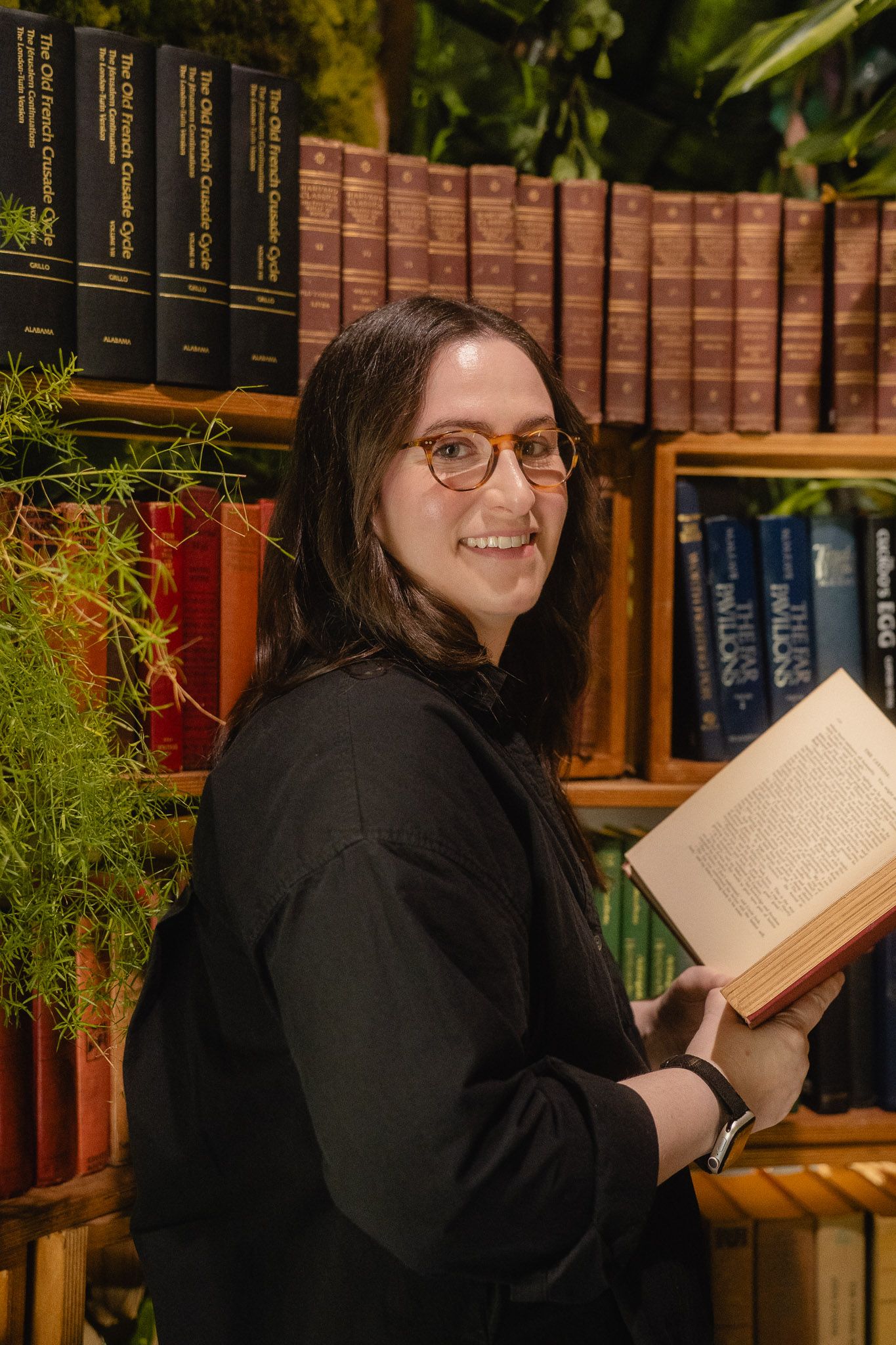 Taipei lifestyle portrait photography for a copywriter holding a book in a library