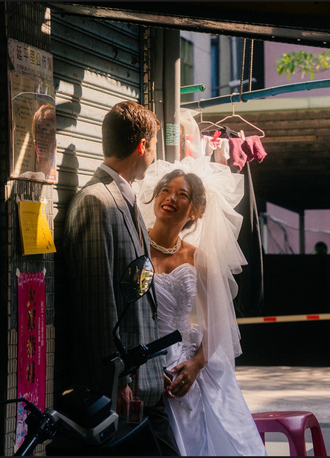 Bride and groom standing on the street for a Taipei pre-wedding photoshoot
