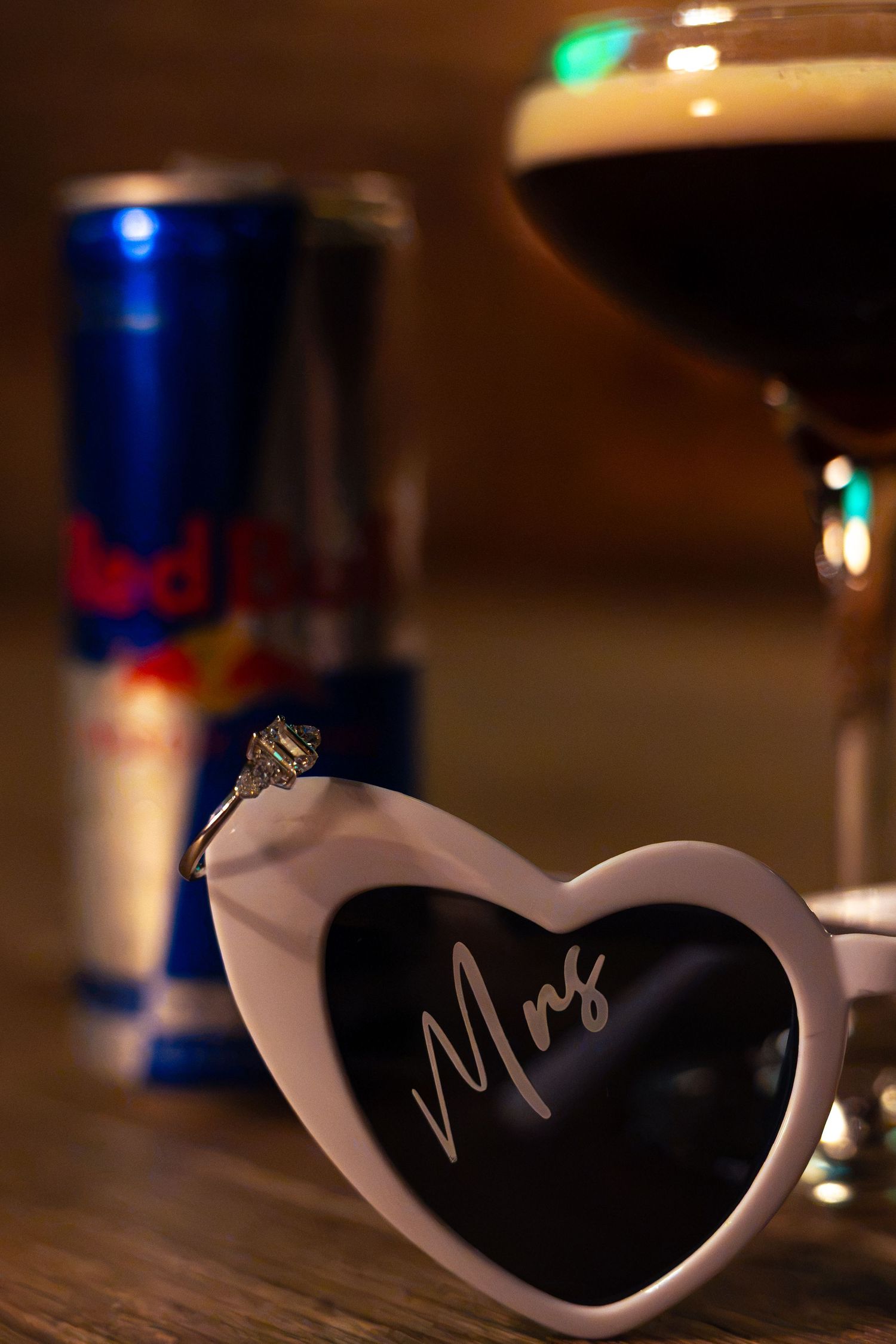 White heart-shaped sunglasses engraved with 