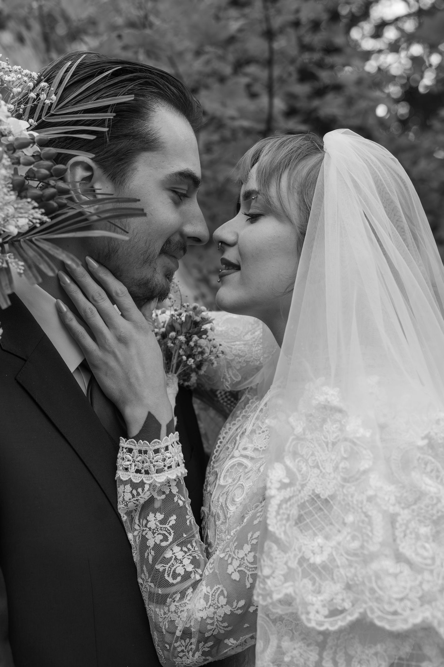 Black and white portrait of bride and groom nearly kissing, bride wearing lace dress and veil. mt hood Oregon