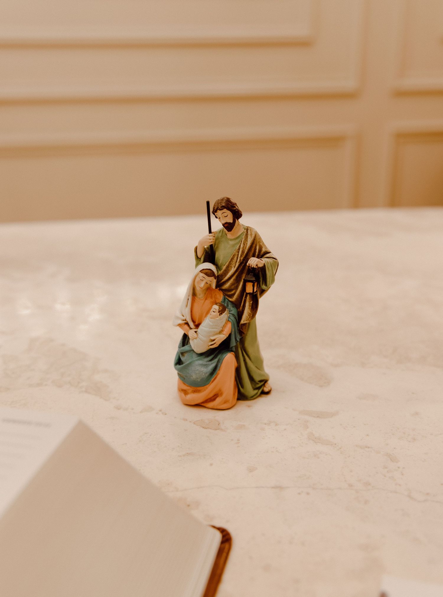 Holy Family figurine at a wedding celebrated on their feast day, symbolizing faith, devotion, and the beauty of Catholic marriage.