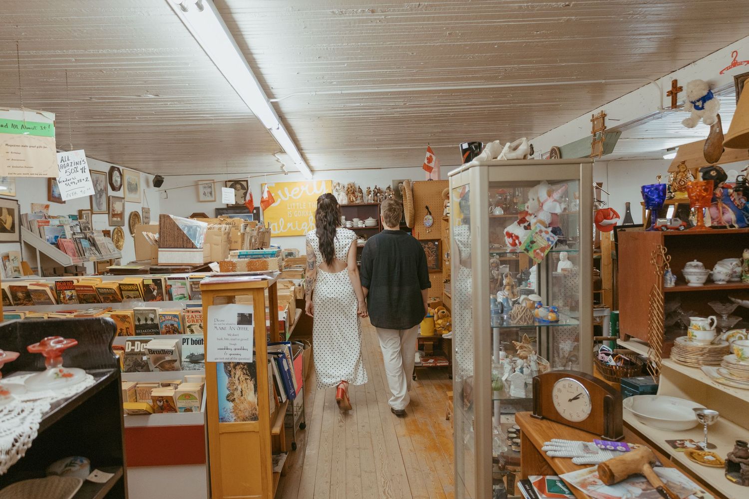 Interior view of an antique store showing aisles filled with vintage collectibles and merchandise.