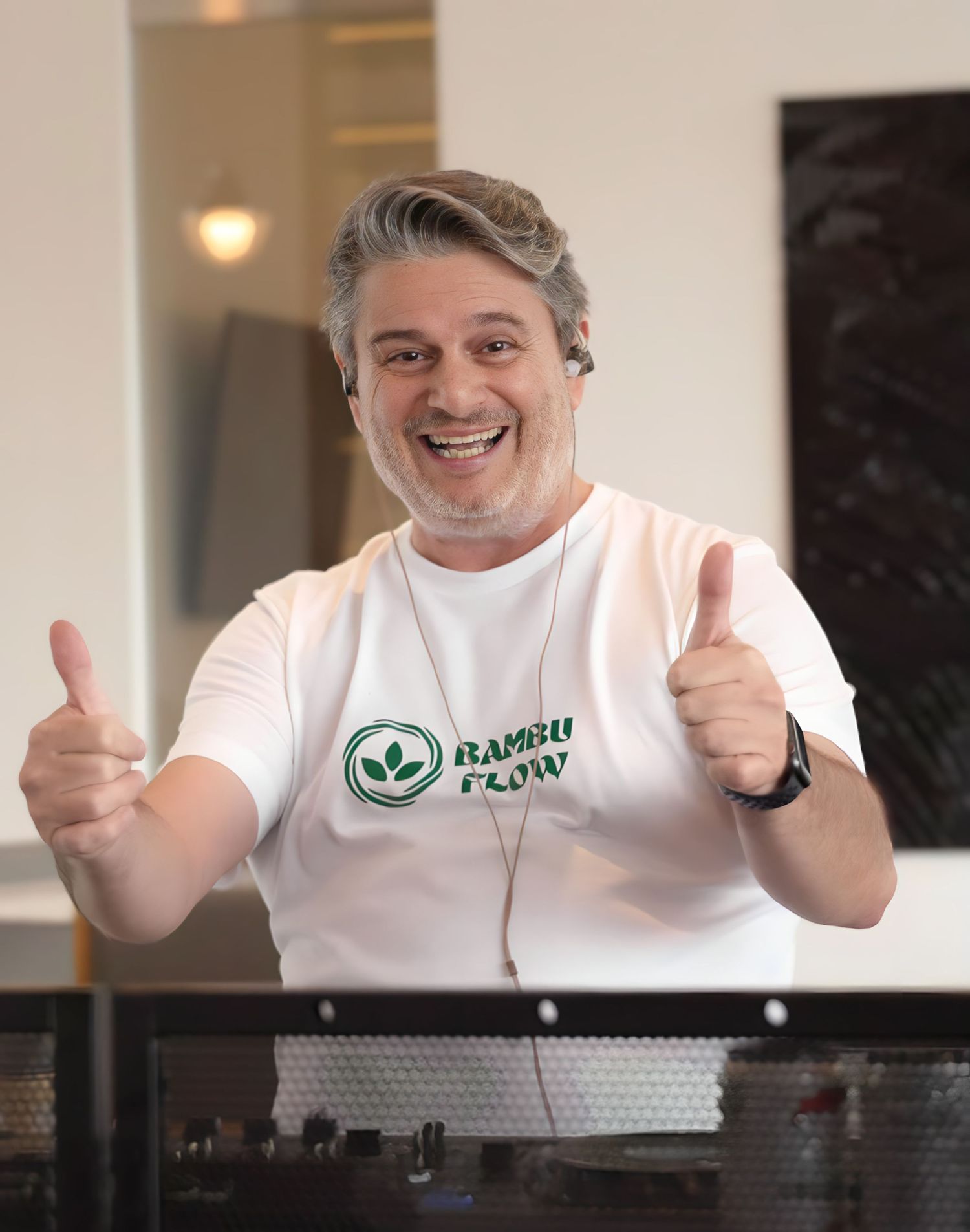 Person in white shirt with logo gives enthusiastic thumbs up in multiple shots.