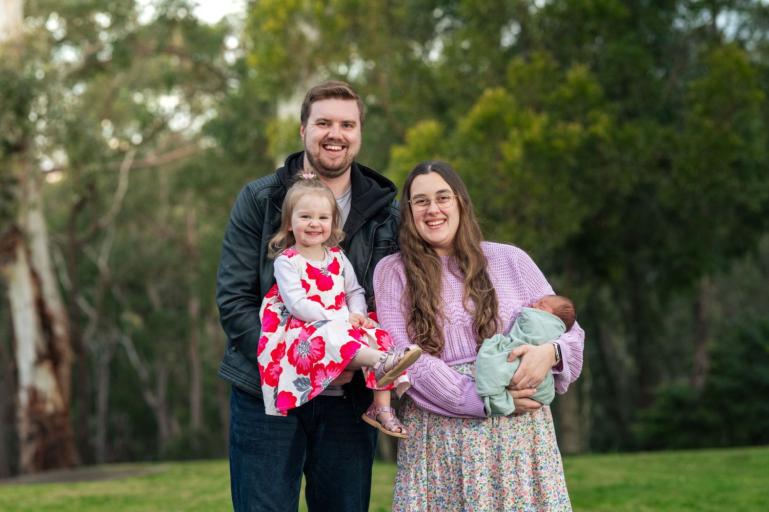 A family photo of Jacob & Mim Photography at their home in Hazelbrook.