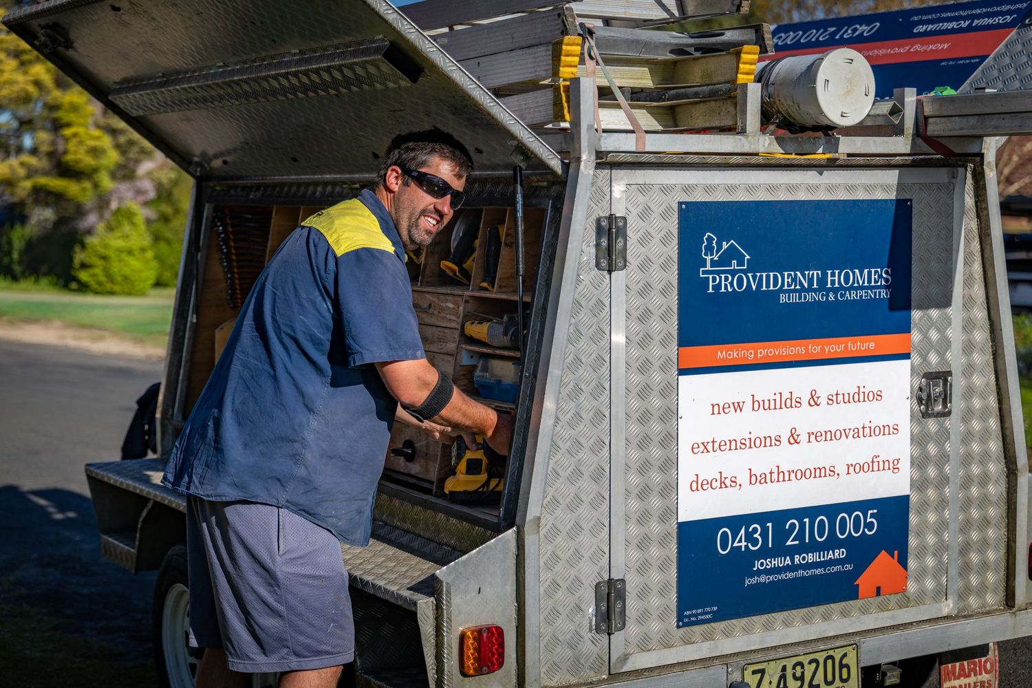 Service vehicle with professional equipment and tools visible through open side compartment in Springwood, Blue Mountains.