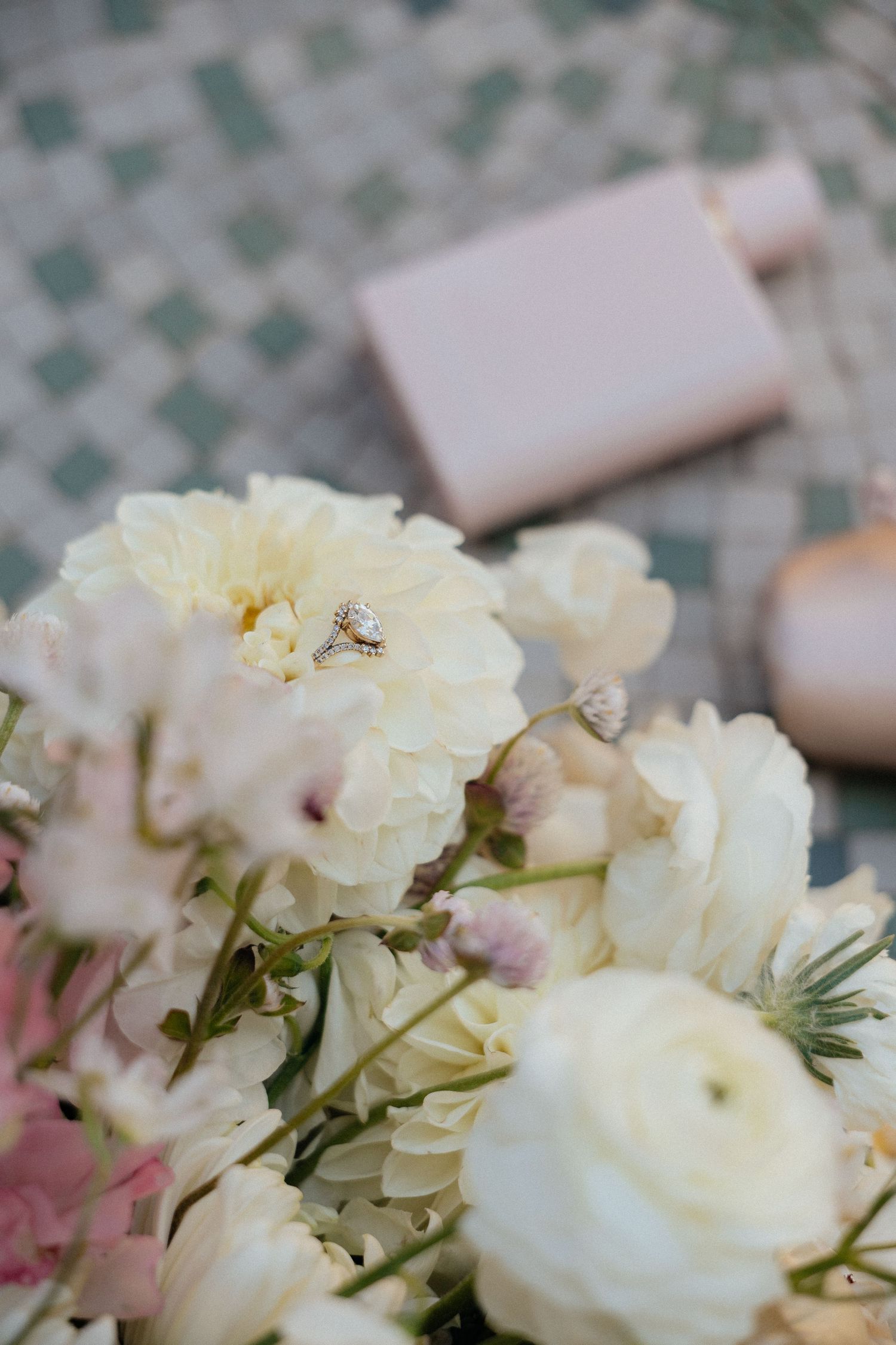 Wedding flat lay with invitation suite and rings