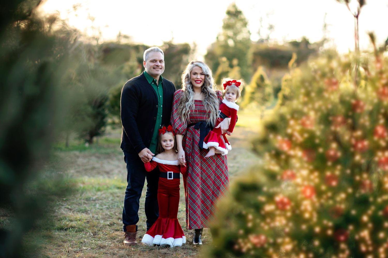 Holiday themed outdoor photoshoot with festive decorations.