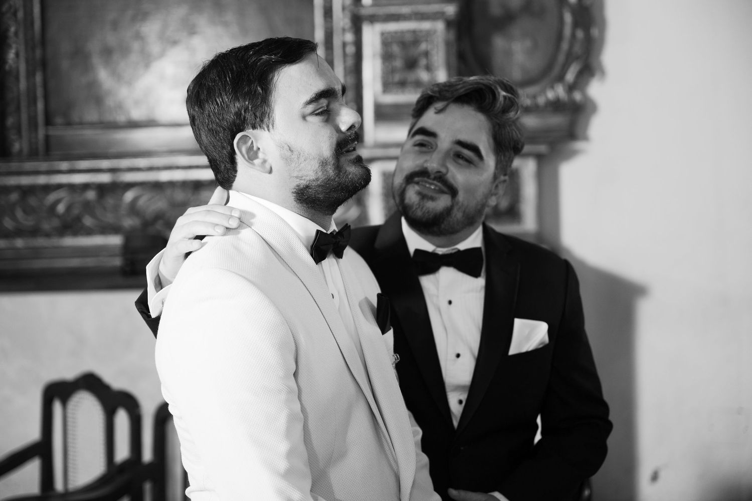 A series of black and white wedding photos showing intimate moments between two people in formal attire.