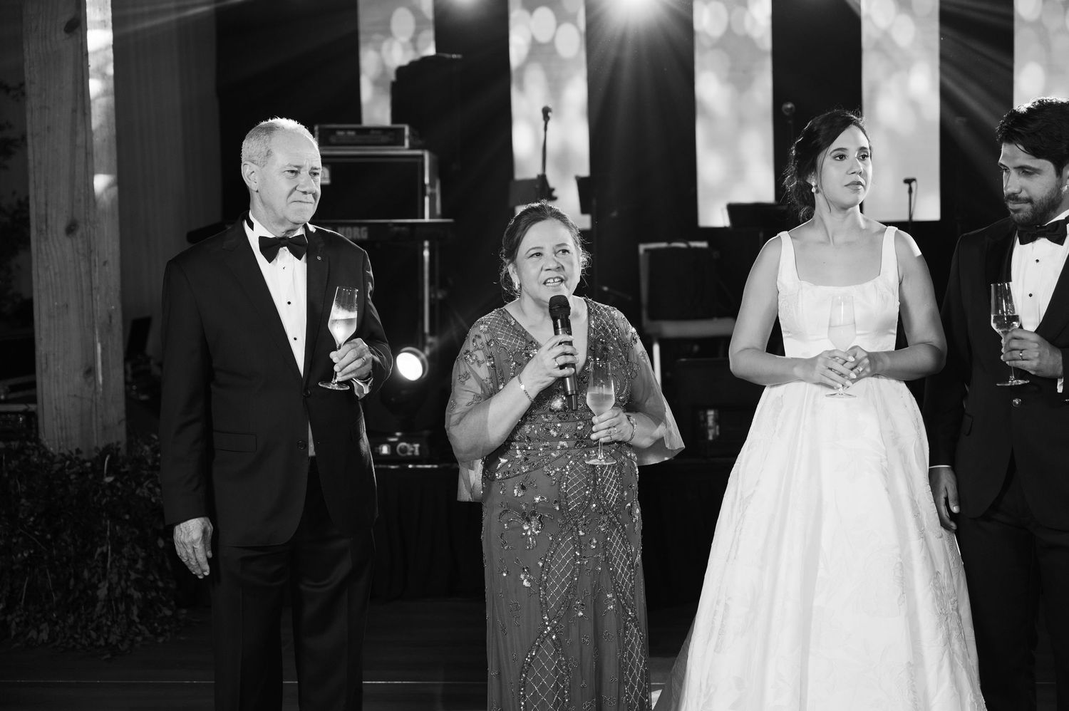 Black and white photo collage showing candid moments from a wedding reception with dancing and celebration.