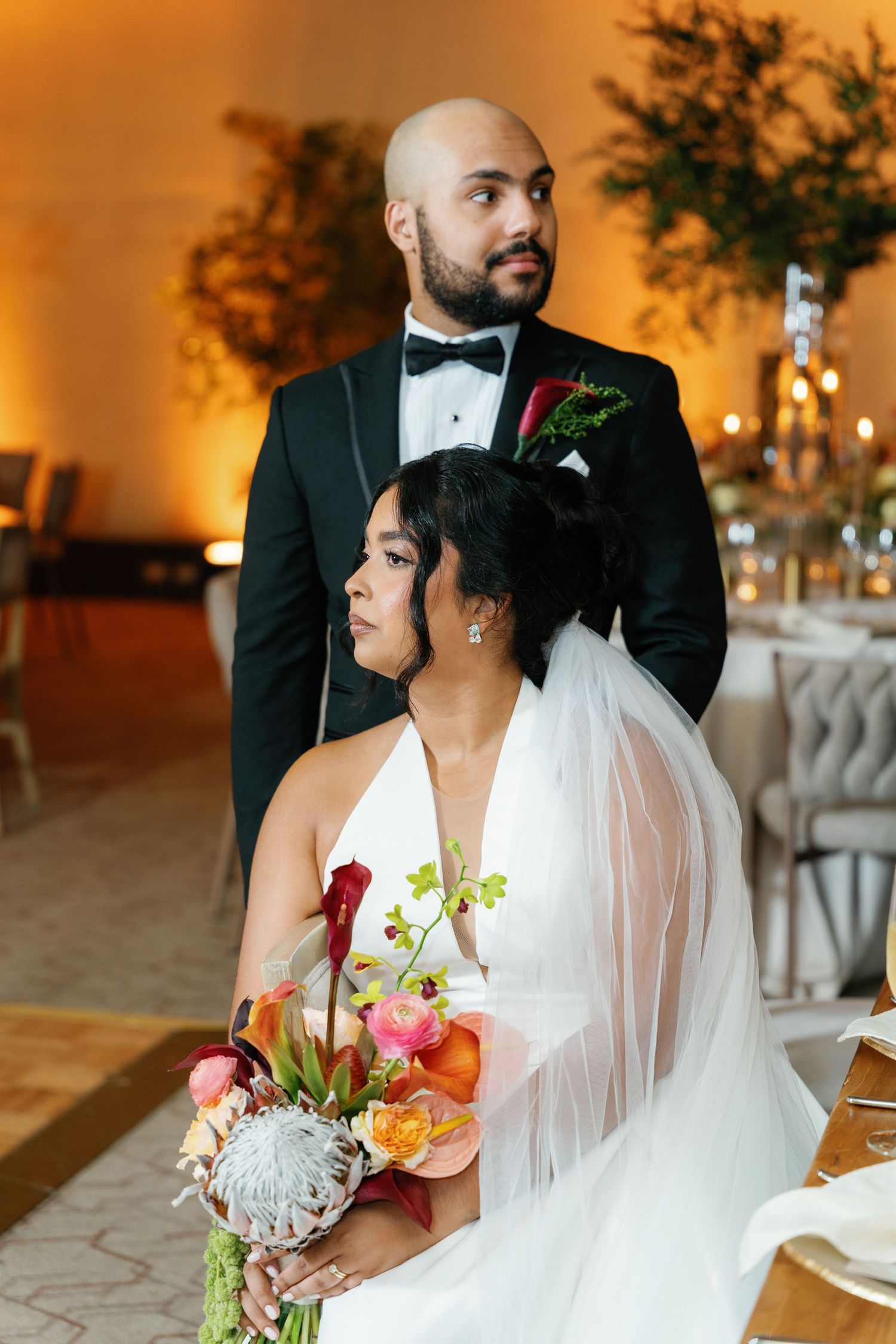 A romantic wedding scene shows a couple in formal attire sharing intimate moments during their reception.