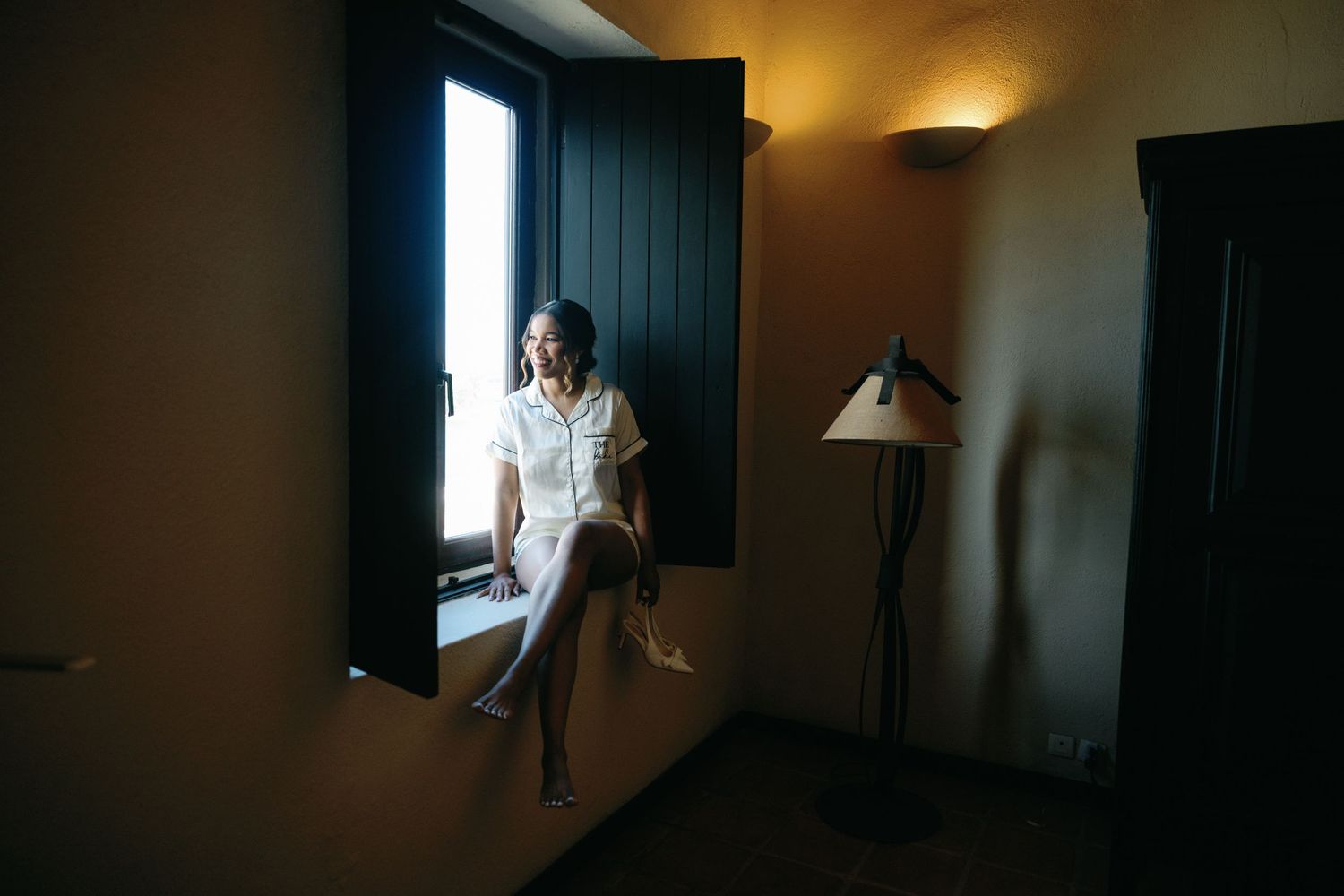 Moody interior hallway photos with dramatic lighting and shadows creating an atmospheric sequence.