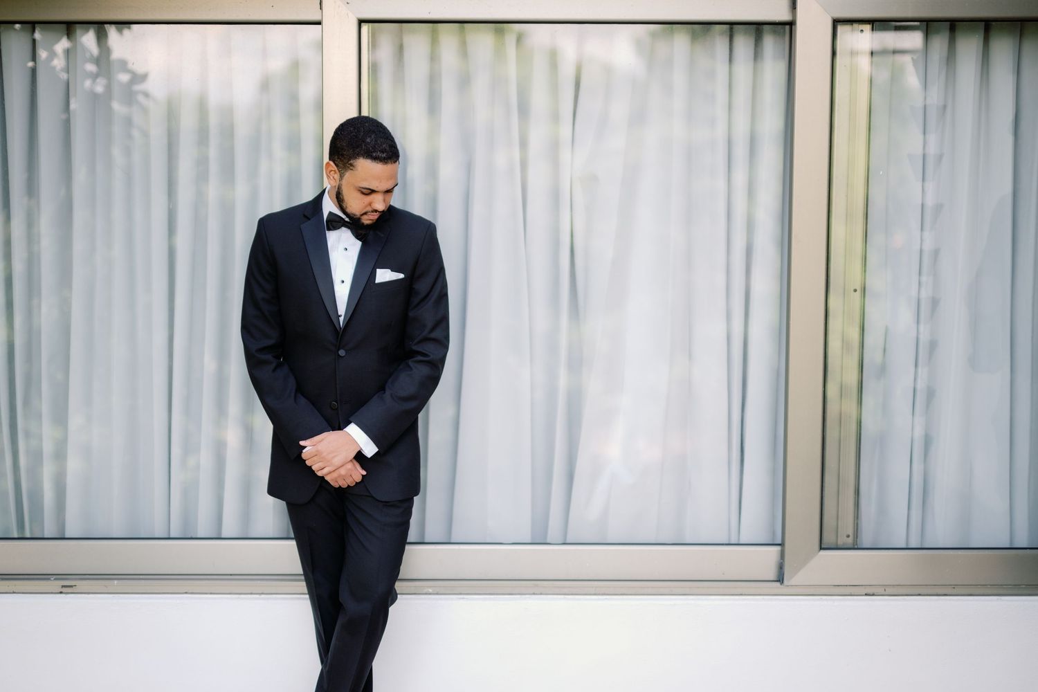 A series of elegant portraits showing formal attire against a modern architectural backdrop.