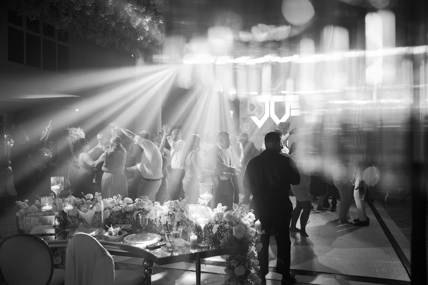 Black and white photos show concert scenes with dramatic lighting, silhouetted figures, and stage performances.