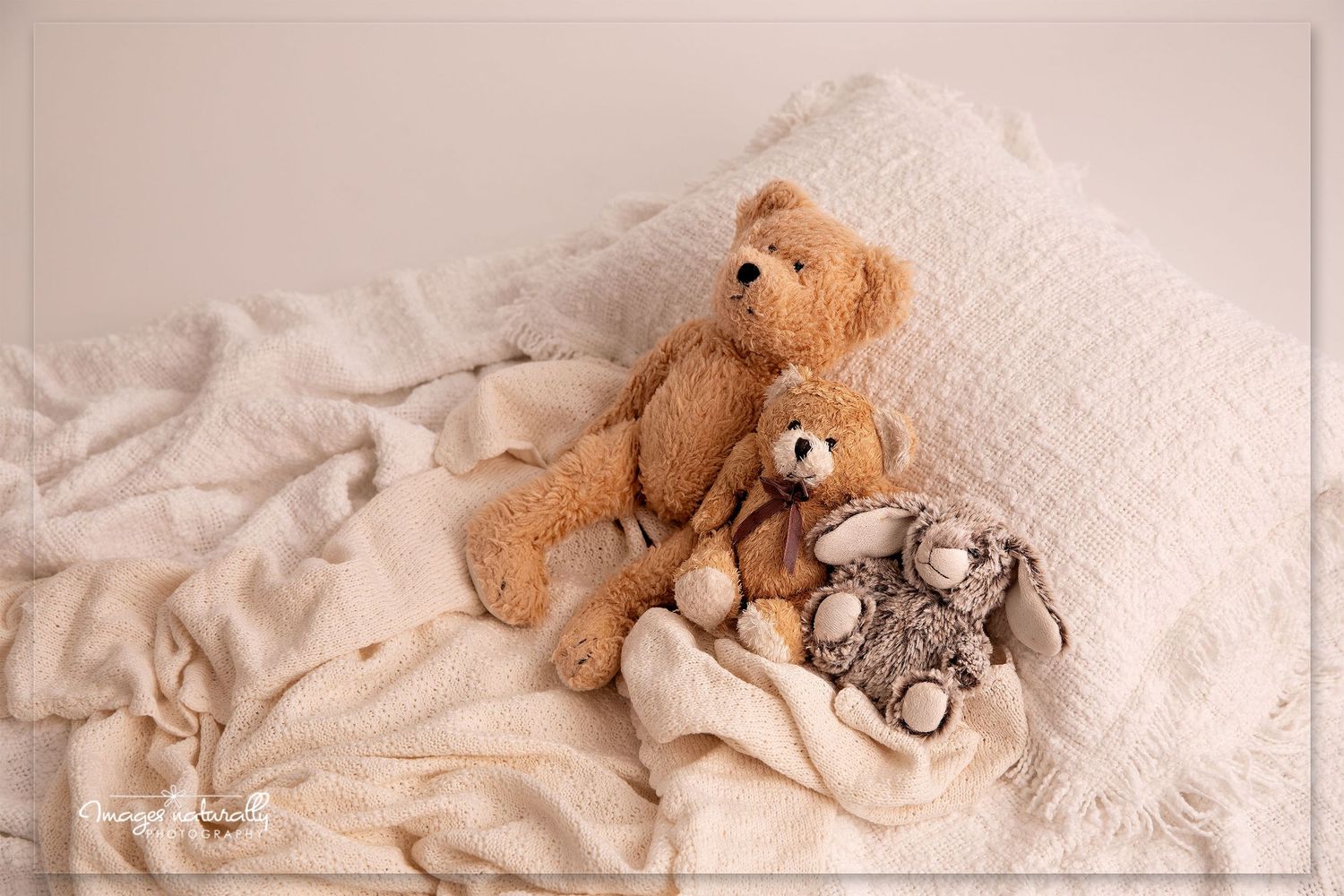 A sequence of photos showing a brown teddy bear in various sleeping positions on white bedding.